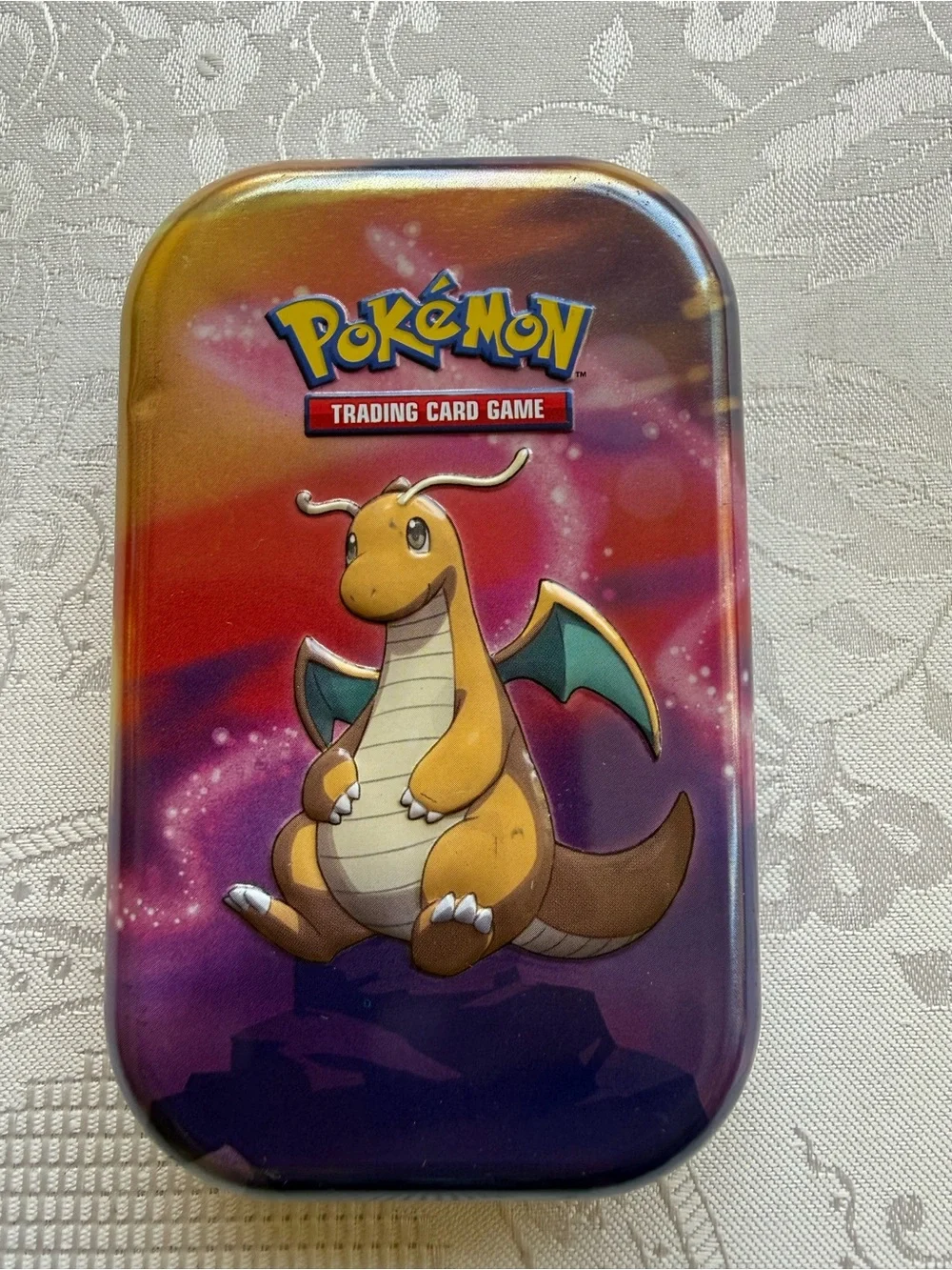 Pokemon Mini Tin Case with Yellow Dragonite and Purple-Orange Gradient
